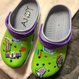 CROCS Green and Purple Toy Story Clogs